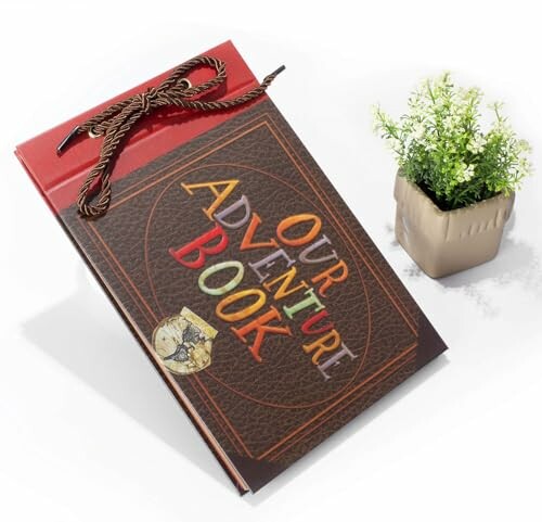 Adventure book with a small potted plant