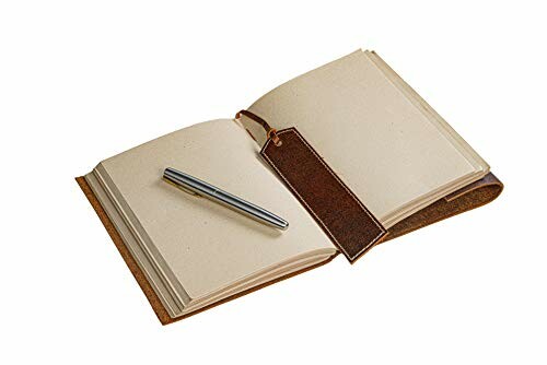 Open notebook with a pen and bookmark.