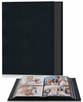 Black photo album with displayed photos