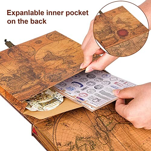 Hands showing an expandable inner pocket in a vintage map-themed journal.